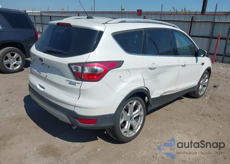 2017 Ford Escape Titanium z USA, uszkodzony, nr VIN 1FMCU0JD9HUB42544